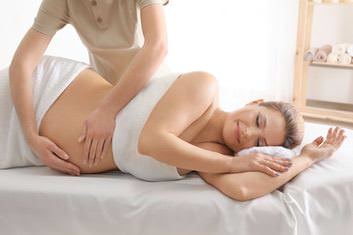 Lady receiving a Prenatal Massage in Stockton, CA